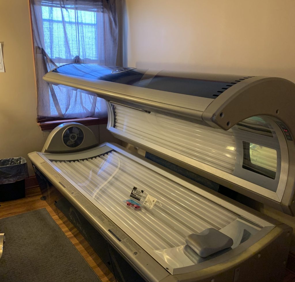 a tanning bed in a room